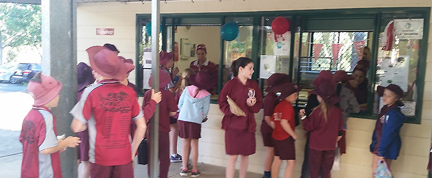 students in line at the school tuckshop